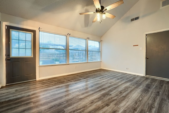 entryway with ceiling fan, high vaulted ceiling, and dark hardwood / wood-style flooring