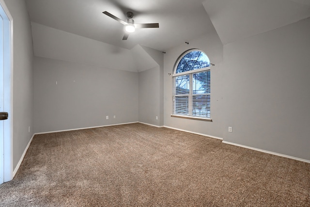 additional living space with vaulted ceiling, ceiling fan, and carpet flooring