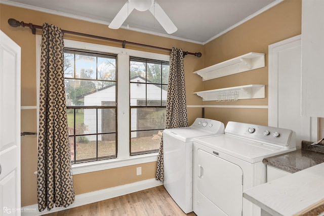 laundry area featuring light hardwood / wood-style floors, ornamental molding, independent washer and dryer, and ceiling fan