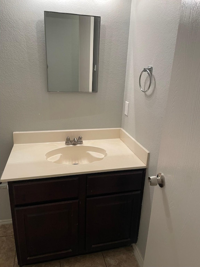 bathroom featuring vanity and tile patterned floors