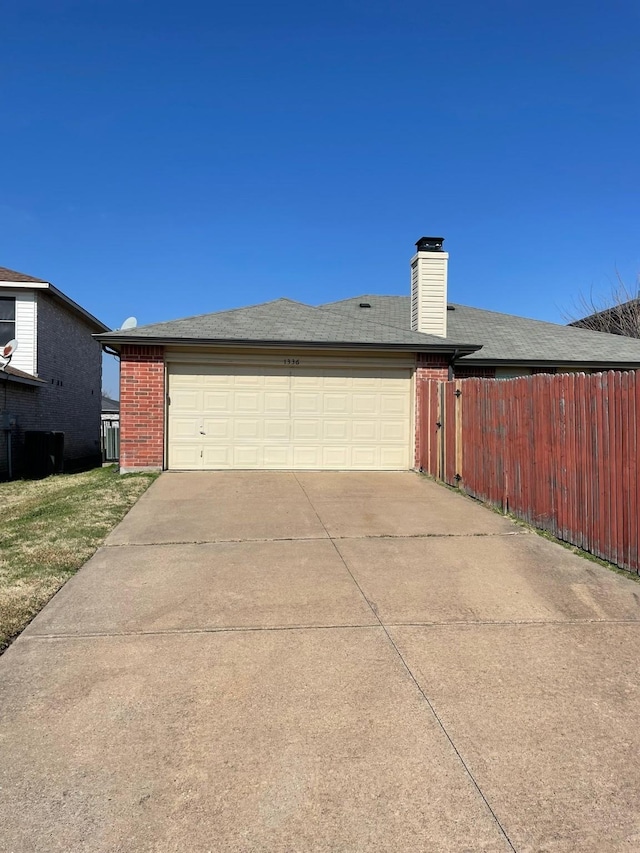 exterior space with a garage