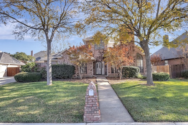 view of front facade with a front lawn