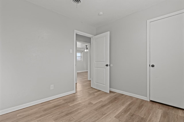 unfurnished bedroom featuring light hardwood / wood-style flooring