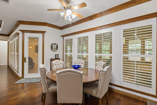 dining area with ornamental molding, dark hardwood / wood-style floors, and ceiling fan