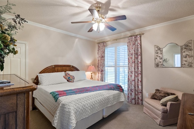 bedroom with ceiling fan, crown molding, a textured ceiling, and carpet flooring