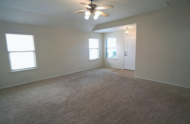 unfurnished room featuring light colored carpet and ceiling fan