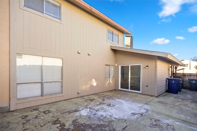 rear view of house featuring a patio