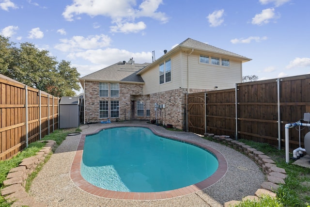 view of pool featuring a storage unit