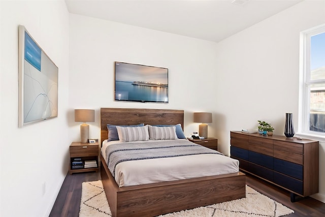 bedroom featuring dark hardwood / wood-style floors