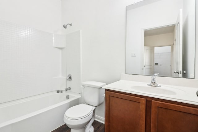 full bathroom with vanity, bathing tub / shower combination, and toilet