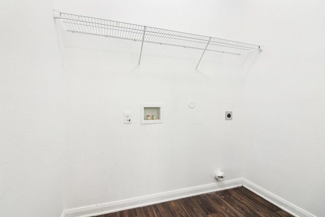 clothes washing area with electric dryer hookup, washer hookup, hookup for a gas dryer, and dark hardwood / wood-style flooring