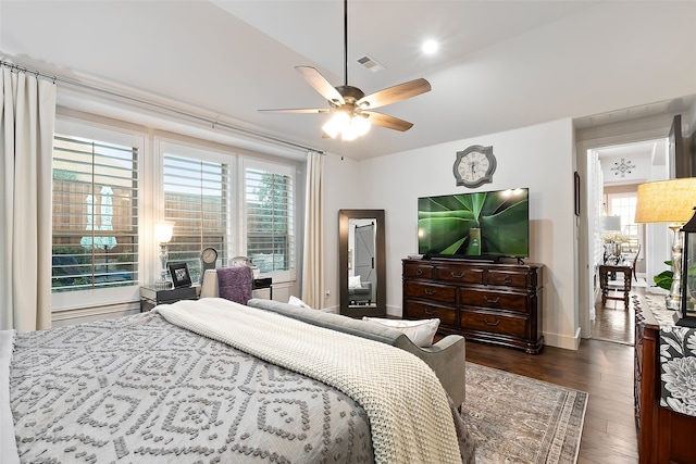 bedroom featuring dark hardwood / wood-style flooring and ceiling fan