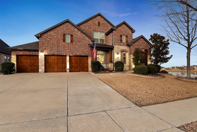 front of property featuring a water view