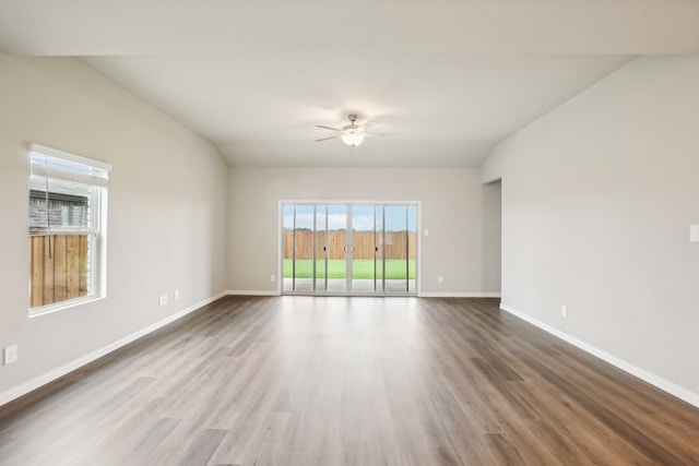 empty room featuring wood-type flooring and ceiling fan