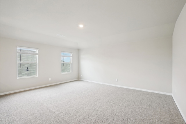 unfurnished room featuring carpet flooring