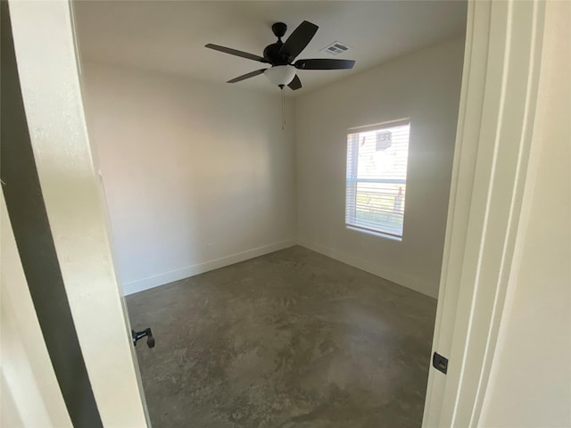 unfurnished room with ceiling fan