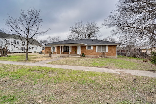 view of front of house with a front lawn and a porch