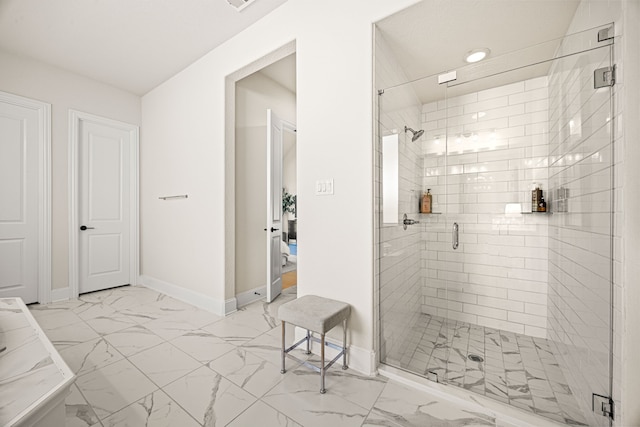 bathroom featuring walk in shower