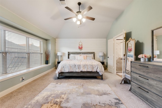 carpeted bedroom with vaulted ceiling and ceiling fan