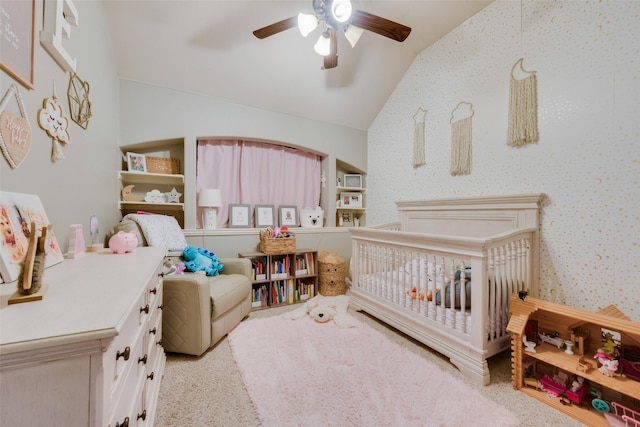 bedroom with ceiling fan, light colored carpet, and lofted ceiling