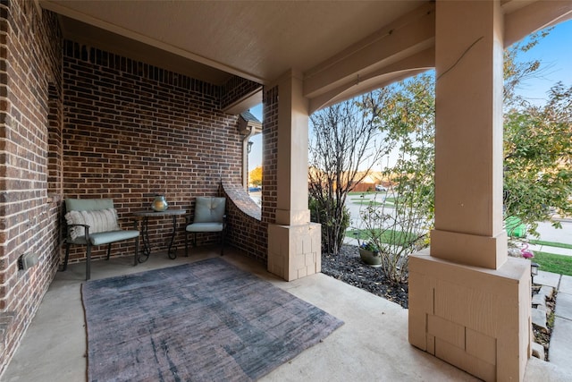 view of patio terrace at dusk