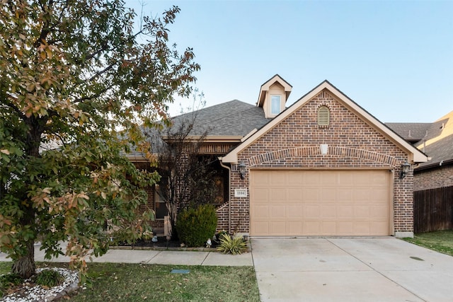 view of front of home featuring a garage