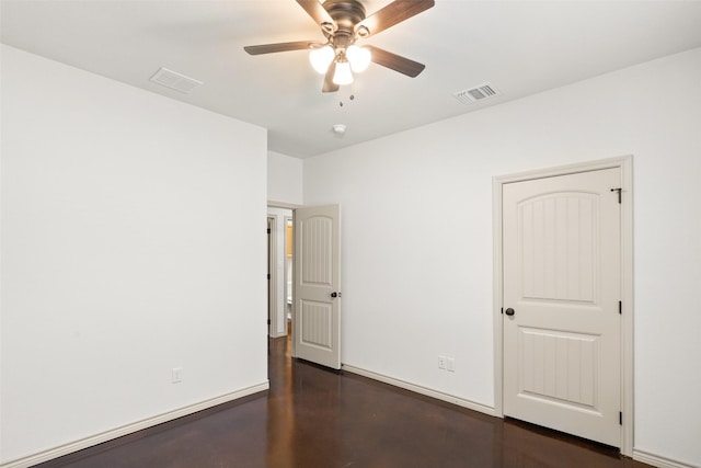 unfurnished bedroom featuring baseboards, visible vents, and ceiling fan