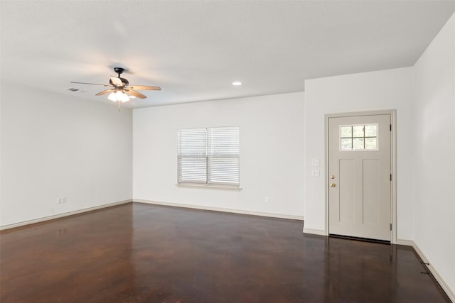 entrance foyer with baseboards, visible vents, a ceiling fan, concrete flooring, and recessed lighting