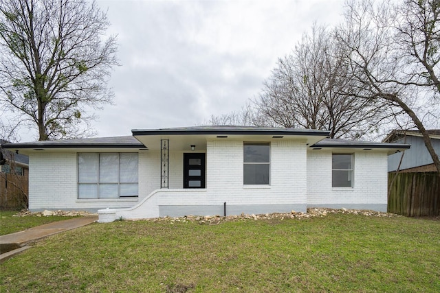 view of front of house with a front lawn