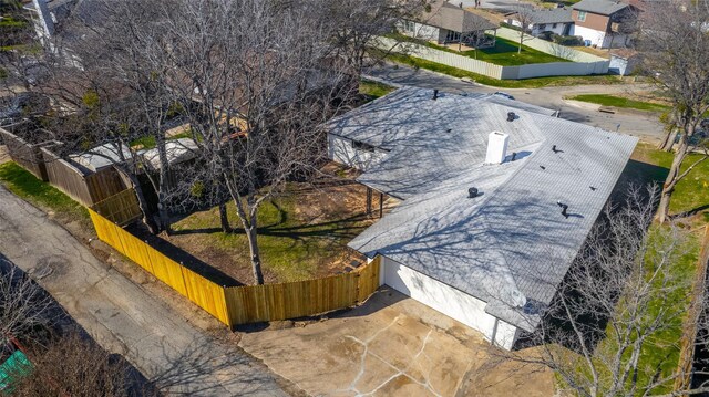 rear view of house with a yard and a patio area