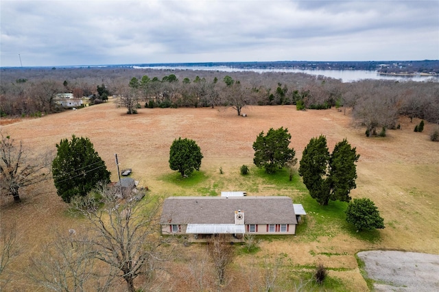 birds eye view of property with a water view and a rural view