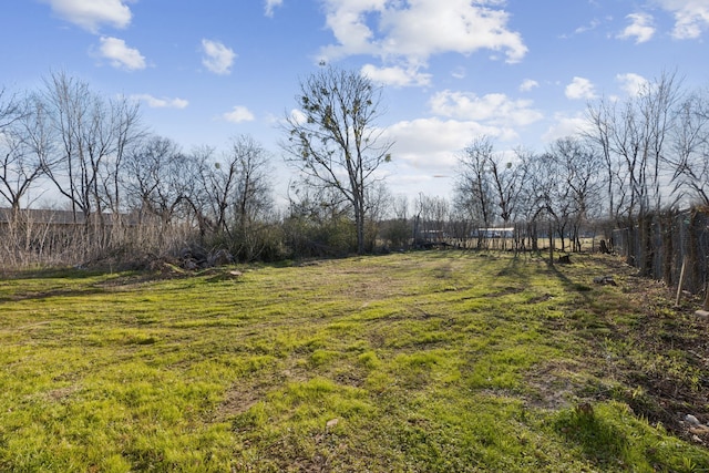 view of yard with a rural view