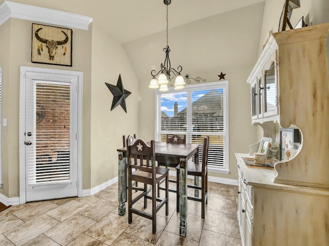 dining room featuring lofted ceiling and a notable chandelier