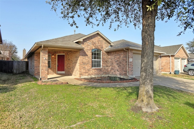 ranch-style house with a garage and a front yard