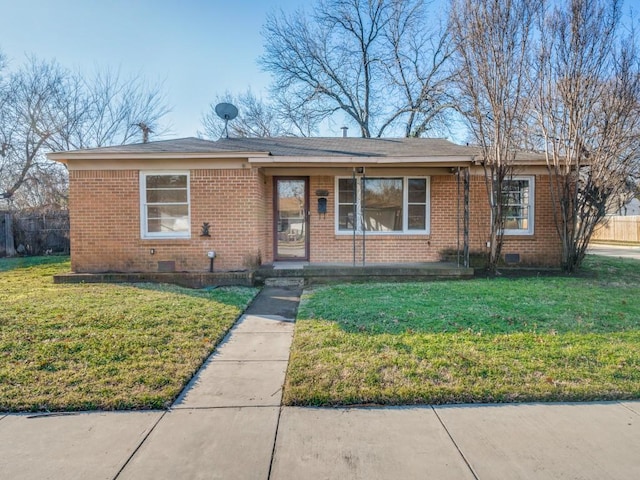 ranch-style home with a front yard