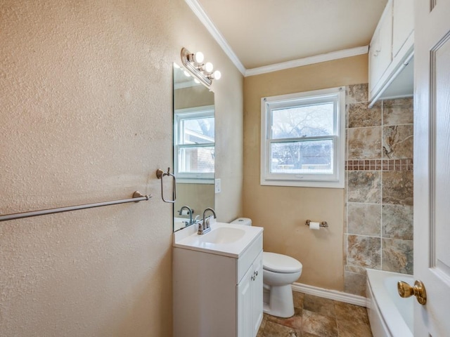 bathroom featuring vanity, ornamental molding, and toilet