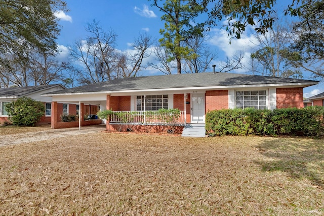 single story home with brick siding and a front lawn