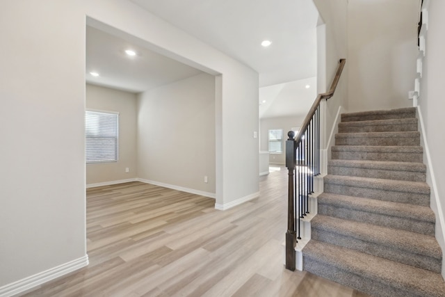 stairway with wood-type flooring