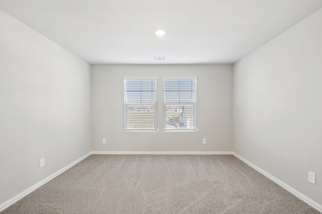 view of carpeted spare room