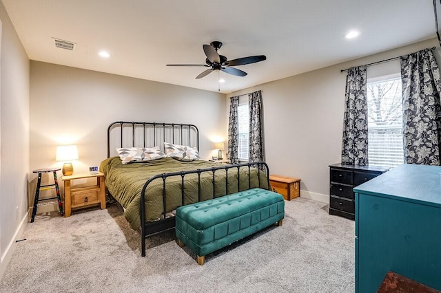 carpeted bedroom with ceiling fan