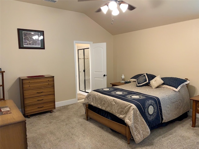 carpeted bedroom with vaulted ceiling and ceiling fan