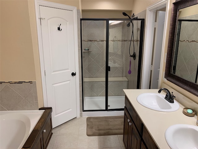 bathroom with vanity, tile patterned flooring, and separate shower and tub