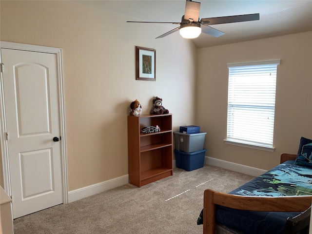 bedroom with light carpet and ceiling fan