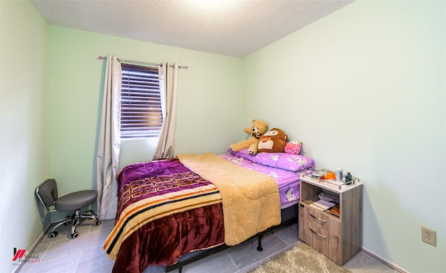 bedroom with a textured ceiling