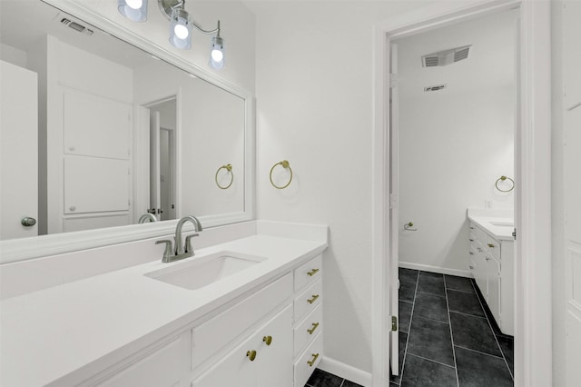 bathroom featuring vanity and tile patterned floors