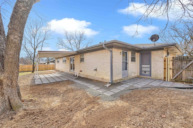 back of house with a patio area