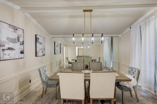 dining area featuring crown molding