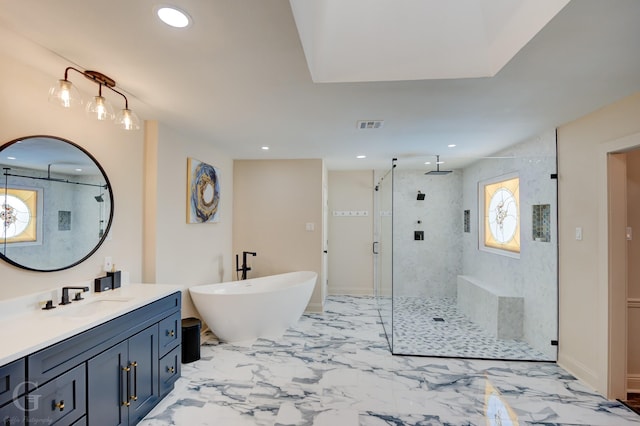 bathroom featuring vanity and separate shower and tub