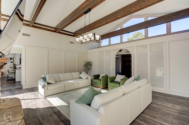 living room featuring high vaulted ceiling, dark hardwood / wood-style floors, an inviting chandelier, and beam ceiling