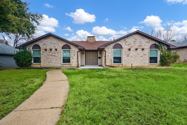 ranch-style house with a front yard